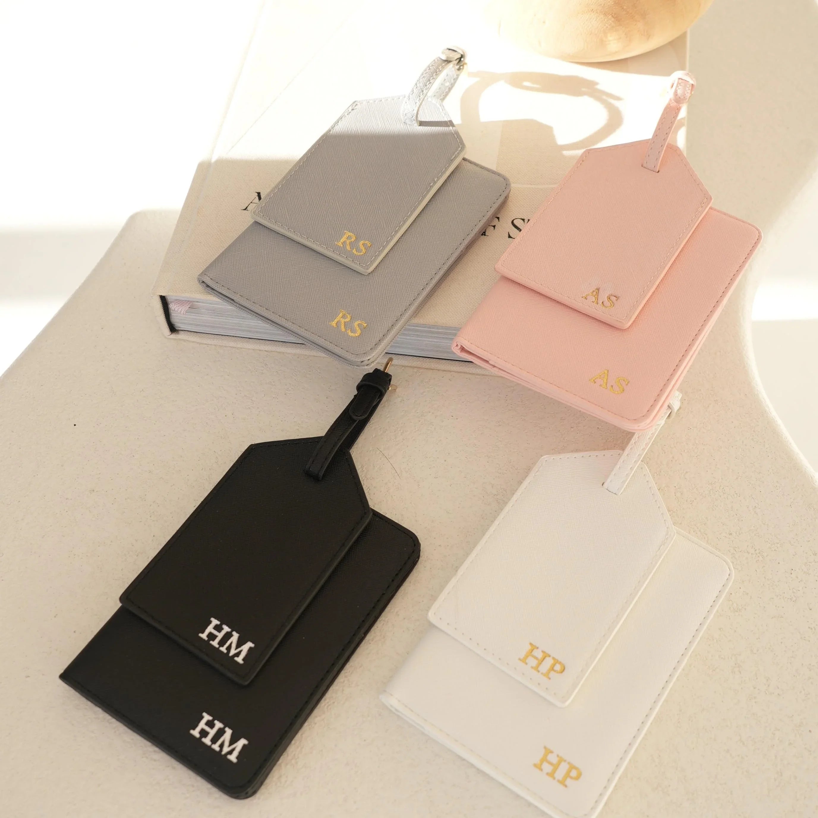 Personalised leather passport holder and luggage tag available in four colours perfect for travel and gifting